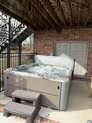 Sit in your private hot tub after soaking in the pool!