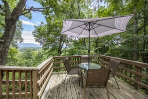 enjoy a meal outdoors on the dining deck (charcoal grill is on this deck)
