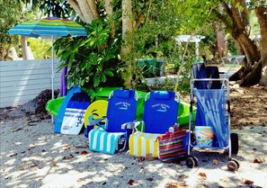 All the beach toys you need, umbrella, chairs, beach blankets, toys, skim boards