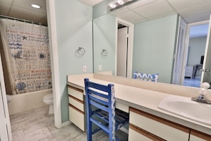 Master bathroom with shower/tub combo.