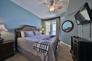 Gulf front master bedroom with a king size bed.