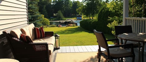 Lovely waterfront property on Lake Leelanau. Private setting on 1.6 acres