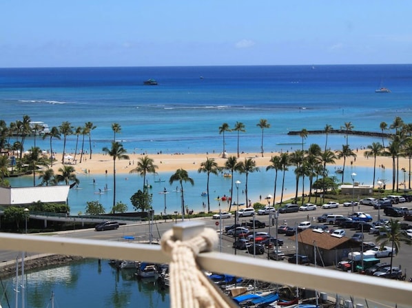 View of the lagoon and Waikiki beach from your lanai with hammock.
