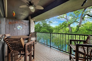 Patio overlooks the river