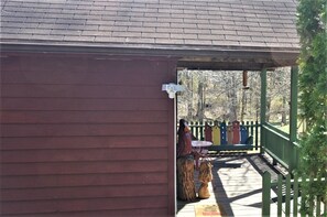 Front porch area with plenty of room for cooler, fishing equipment, etc.