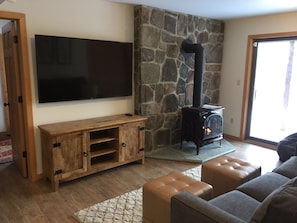 Lower level provides additional TV space and a warm gas stove
