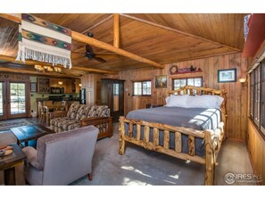 Comfortable queen bed on an aspen log frame