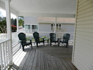 Front Porch wraps to screened porch and rear deck