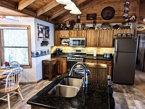 Another kitchen view.  Ambiance lighting above cabinets.