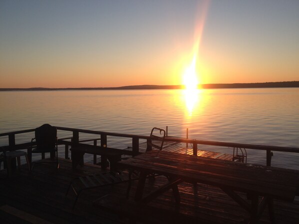 Watch the sun set and the Milky Way appear in comfortable aged deck furniture 