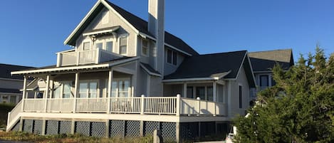 Home seen from the back facing nothing but dunes and water