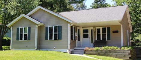 House has a large fenced in yard in the back. Check out the video.