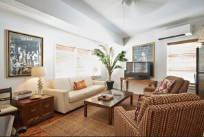 Living room has comfortable queen fold out sofa and two lazy boy chairs