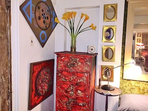 Artistic, hand-painted bedroom dresser, objects d'art.