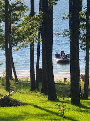 Pull your Boat up Behind the House at our Sandy Beach.