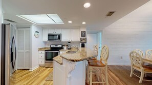 Kitchen with Granite Countertops and Stainless Steel Appliances