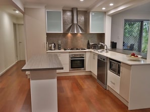 Kitchen with Gas Cooking, huge fridge, filtered water and ice maker, microwave