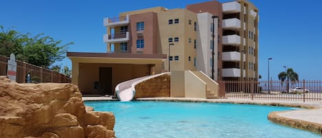 Pool and slide with Building A View