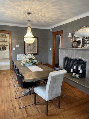 Gather to eat or play games. We have room for 10 around this large farm table.
