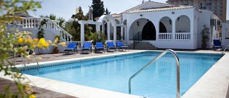 View of the house from shallow end of the pool