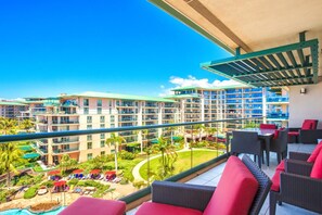 Balcony bliss with sweeping views of the resort and sea.