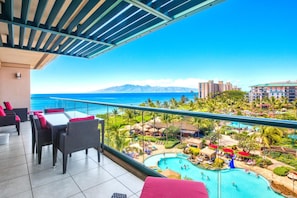 Sip cocktails with front-row ocean and sunset views.