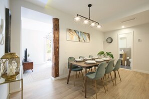 Kitchen & Dining table with view of the living room