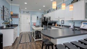 Fully equipped kitchen with bar seating