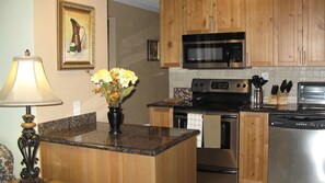 Kitchen, granite counter tops and stainless steel appliances