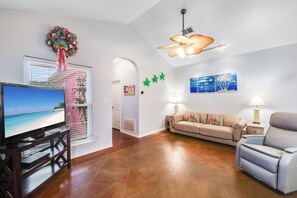 Spacious living area with new queen size sleeper sofa