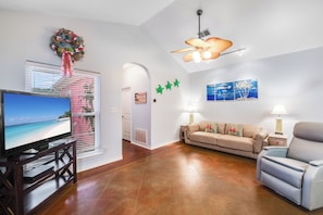Spacious living area with new queen size sleeper sofa