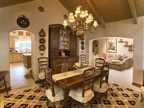 Formal Dining Room with large table to entertain and easy access to kitchen.