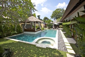 Private swimming pool with jacuzzi and gazebo