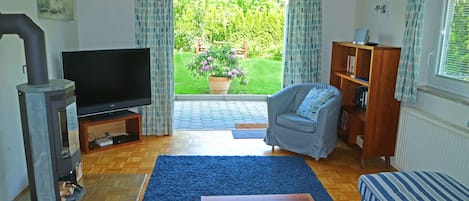 Terrace Apartment living area looking out over the garden.