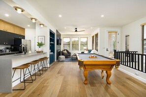 Pool table, breakfast bar, living space