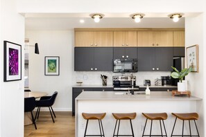 Kitchen, breakfast bar, dining area