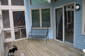 Large open porch next to screened porch