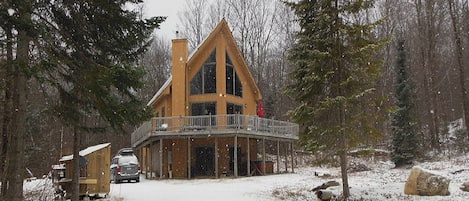 A view of the house looking up the driveway after some early season snow.