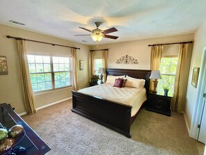 Master bedroom with a king en suite bathroom. Room with lake and pool view