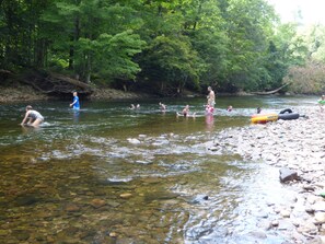 Very private beach: gentle current up to waist-high for tubing or dipping.