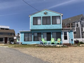 Parking to the right of the house fits 4 cars comfortably
