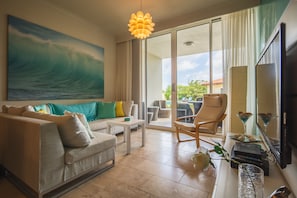 living area looking out onto patio poolside