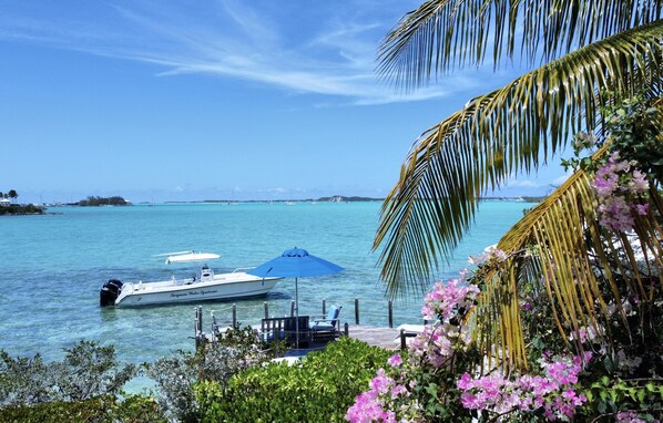 CALM, SHALLOW WATERFRONT DECK AT THE VILLA