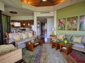 Open concept main living area with uplighted cathedral ceilings; pull-out couch