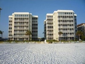 Exterior from the beach. Beach chairs provided on the beach and in the unit.
