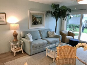 Living room with patio garden view