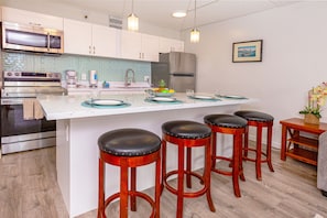 Fully equipped kitchen with dining area and full-size appliances!