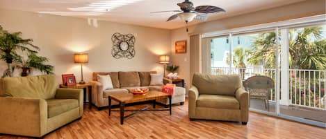 Spacious living room with two single pull-out beds.