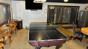 Conversion Ping Pong Table Top in Recreation Room.