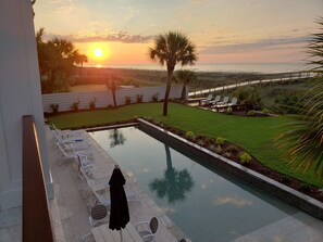 Gorgeous sunrise reflections on 50'  beach entry pool